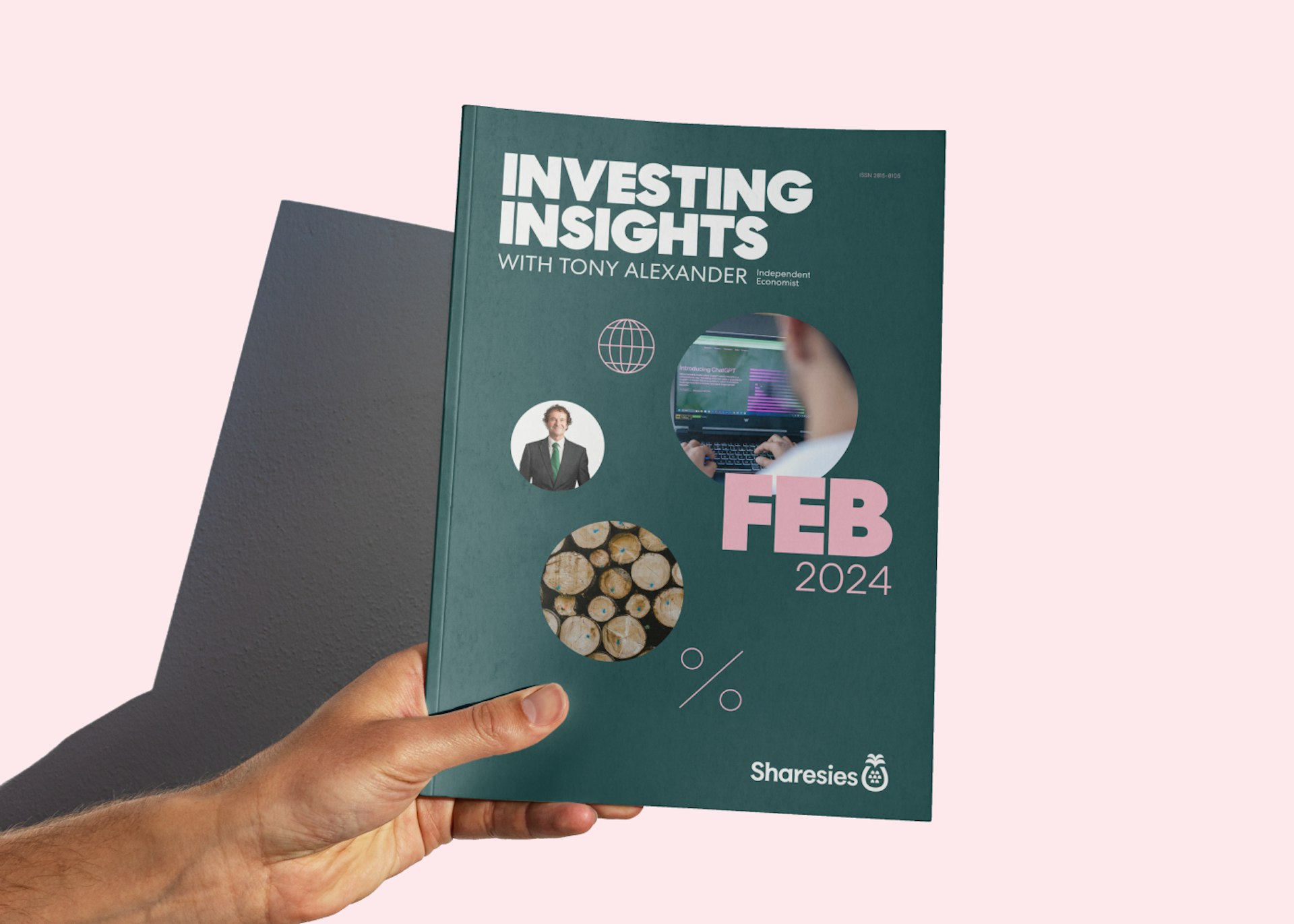 A hand holds Tony's February report on a pink background.