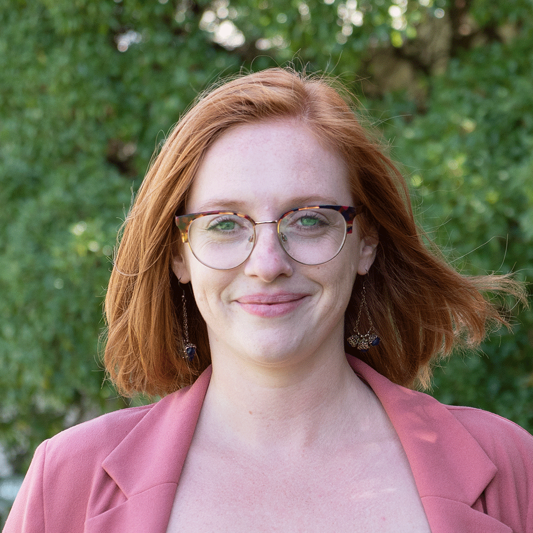 Demi smiles at the camera.